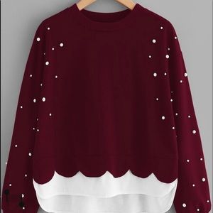 Pull on burgundy cozy fleece sweater with pearl details